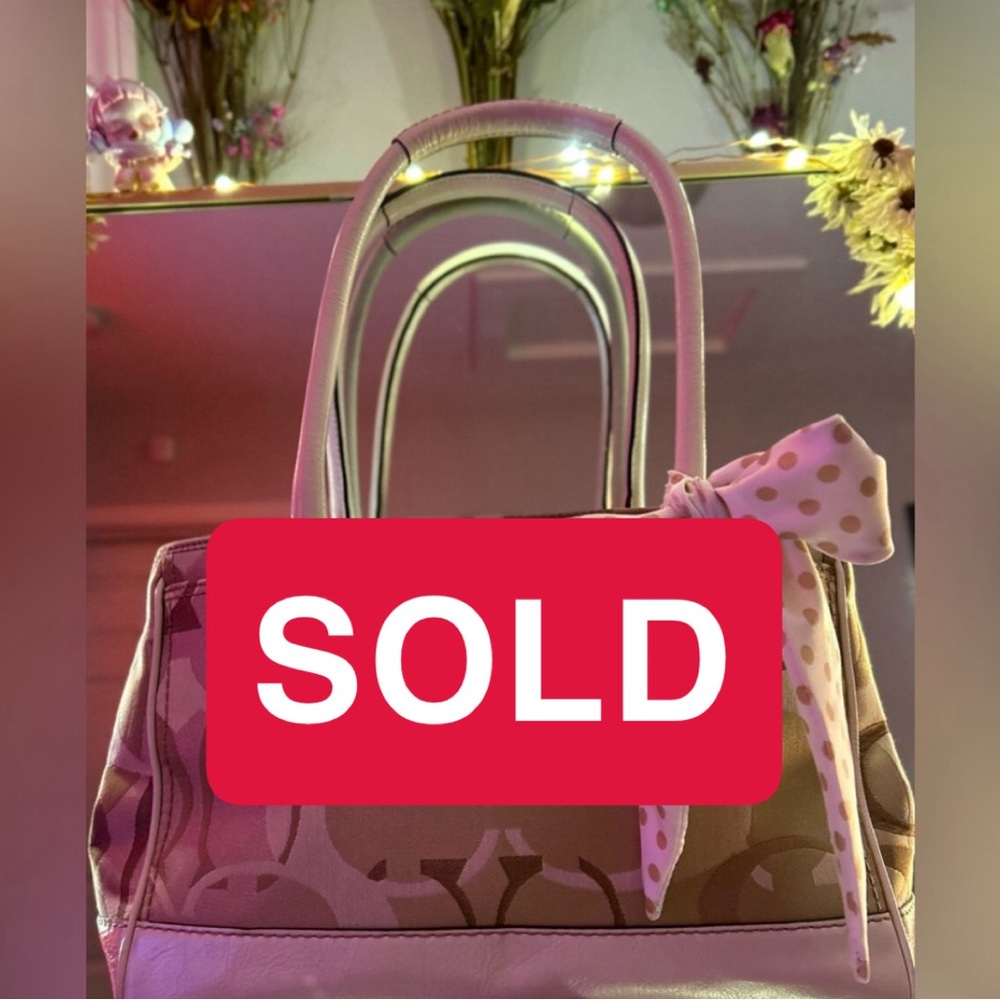 Stylish Tan and Cream Coach Bag
